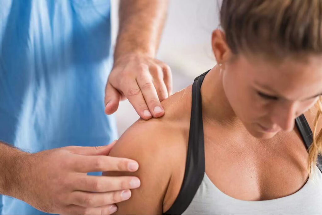 Copy of Copy of physical therapy therapist addressing trapezius m 2021 08 26 16 53 18 utc 1@2x