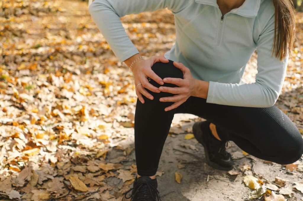 Copy of Copy of the girl suffers from pain spasm sprain of the kn 2023 11 27 05 36 11 utc